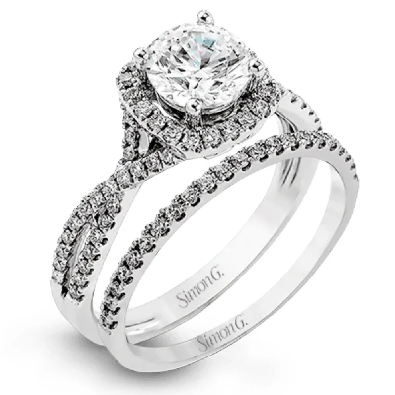 Elegant Jewelry, Exclusive Prices – Shop Now Simon G. 18k Round-Cut Halo Engagement Ring with Diamonds Elegant Jewelry, Exclusive Prices – Shop Now Simon G. 18k Round-Cut Halo Engagement Ring with Diamonds