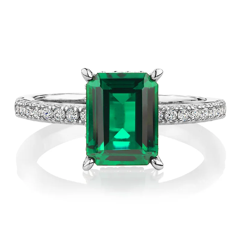 Shop Dazzling Jewelry With Special Promotional Discounts Dress ring with emerald simulant and 0.26 carats* of diamond simulants in sterling silver Shop Dazzling Jewelry With Special Promotional Discounts Dress ring with emerald simulant and 0.26 carats* of diamond simulants in sterling silver