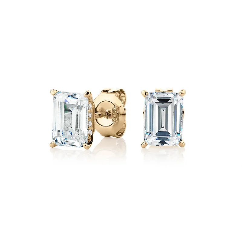 Exclusive Gemstone Jewelry At Special Prices Emerald cut stud earrings with 2.24 carats* of diamond simulants in 10 carat yellow gold Exclusive Gemstone Jewelry At Special Prices Emerald cut stud earrings with 2.24 carats* of diamond simulants in 10 carat yellow gold