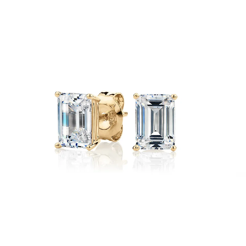 High-Quality Gemstone Jewelry For Special Occasions Emerald Cut stud earrings with 2 carats* of diamond simulants in 10 carat yellow gold High-Quality Gemstone Jewelry For Special Occasions Emerald Cut stud earrings with 2 carats* of diamond simulants in 10 carat yellow gold
