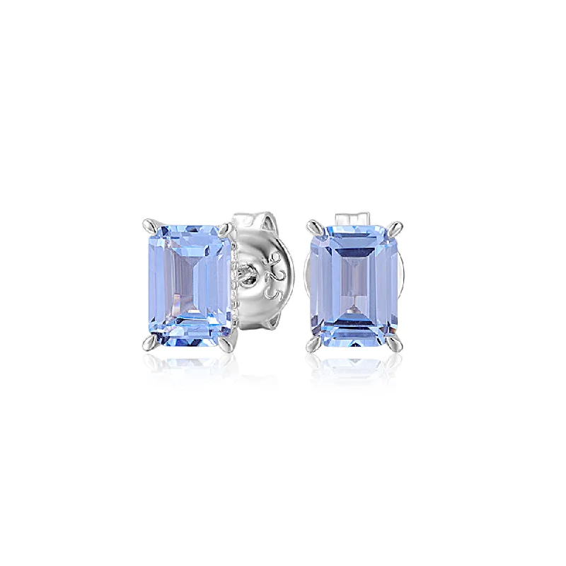 Trendy And Classic Jewelry Now At Reduced Prices Emerald Cut stud earrings with blue topaz simulants in sterling silver Trendy And Classic Jewelry Now At Reduced Prices Emerald Cut stud earrings with blue topaz simulants in sterling silver