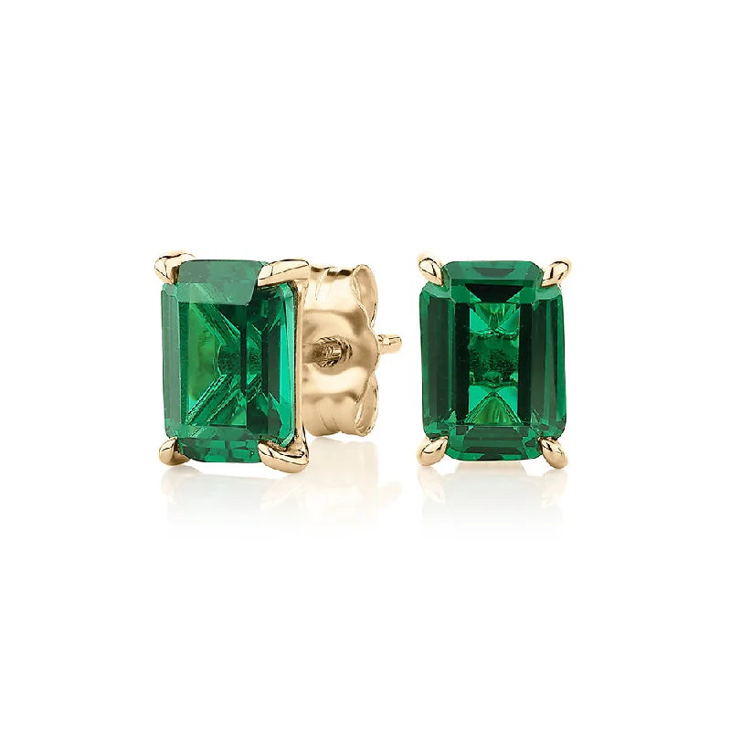 Exclusive Online Discounts On Stylish Jewelry Emerald Cut stud earrings with emerald simulants in 10 carat yellow gold Exclusive Online Discounts On Stylish Jewelry Emerald Cut stud earrings with emerald simulants in 10 carat yellow gold