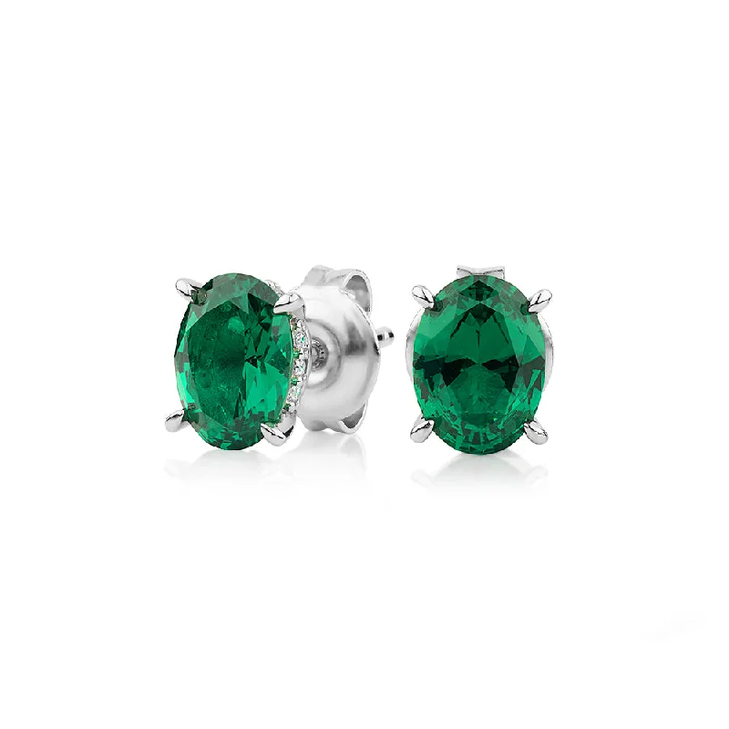 Big Savings On Your Favorite Jewelry Pieces Oval and Round Brilliant stud earrings with emerald and diamond simulants in sterling silver Big Savings On Your Favorite Jewelry Pieces Oval and Round Brilliant stud earrings with emerald and diamond simulants in sterling silver