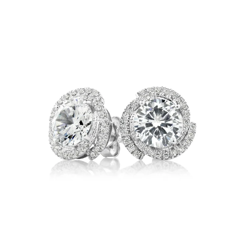 Sparkle On A Budget – Fine Jewelry For Less Round Brilliant halo stud earrings with 2.27 carats* of diamond simulants in 10 carat white gold Sparkle On A Budget – Fine Jewelry For Less Round Brilliant halo stud earrings with 2.27 carats* of diamond simulants in 10 carat white gold