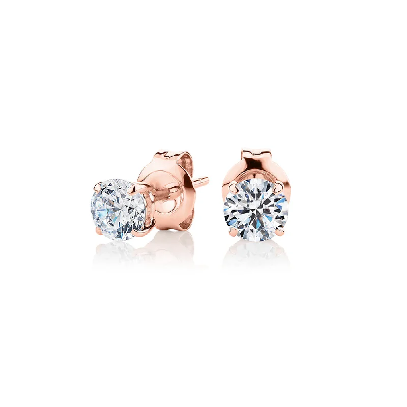 Fashion-Forward Geometric Jewelry For Contemporary Style Round Brilliant stud earrings with 1 carat* of diamond simulants in 10 carat rose gold Fashion-Forward Geometric Jewelry For Contemporary Style Round Brilliant stud earrings with 1 carat* of diamond simulants in 10 carat rose gold