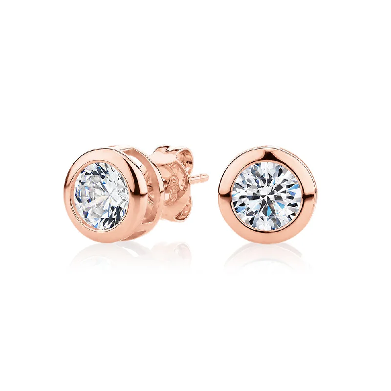 Seasonal Jewelry Deals – Elevate Your Style Round Brilliant stud earrings with 2 carats* of diamond simulants in 10 carat rose gold Seasonal Jewelry Deals – Elevate Your Style Round Brilliant stud earrings with 2 carats* of diamond simulants in 10 carat rose gold