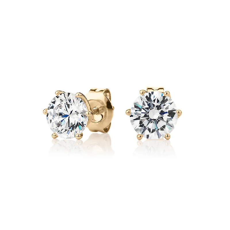 Elegant Jewelry Styles At Budget-Friendly Prices Round Brilliant stud earrings with 2 carats* of diamond simulants in 10 carat yellow gold Elegant Jewelry Styles At Budget-Friendly Prices Round Brilliant stud earrings with 2 carats* of diamond simulants in 10 carat yellow gold