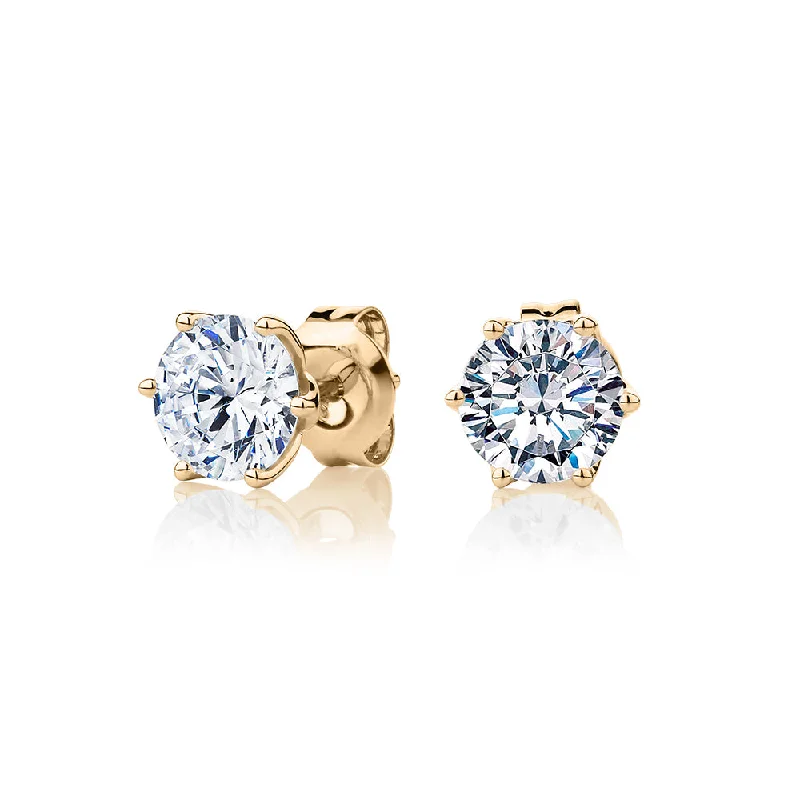 Seasonal Jewelry Deals – Elevate Your Style Round Brilliant stud earrings with 2 carats* of diamond simulants in 10 carat yellow gold Seasonal Jewelry Deals – Elevate Your Style Round Brilliant stud earrings with 2 carats* of diamond simulants in 10 carat yellow gold