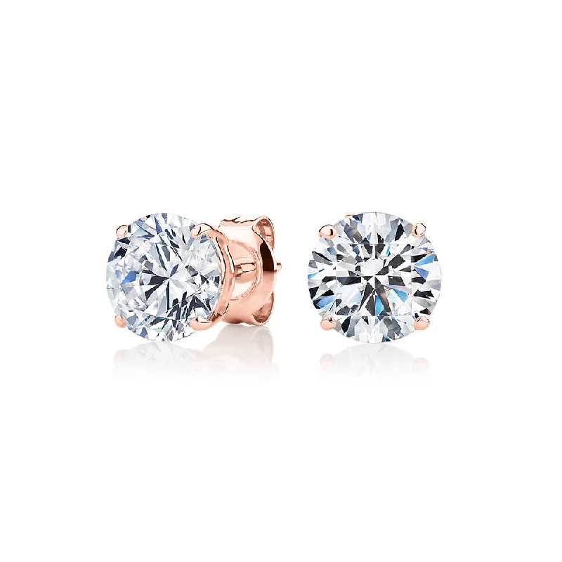 Shop Elegant Jewelry At Unbeatable Prices Round Brilliant stud earrings with 3 carats* of diamond simulants in 10 carat rose gold Shop Elegant Jewelry At Unbeatable Prices Round Brilliant stud earrings with 3 carats* of diamond simulants in 10 carat rose gold