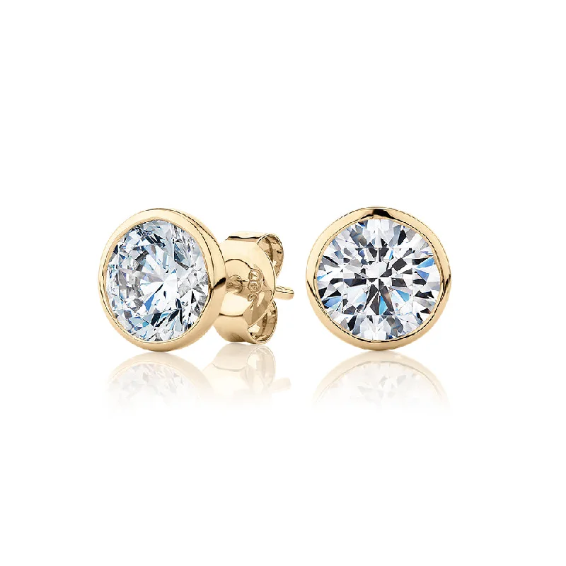 Bohemian-Inspired Jewelry For Free-Spirited Fashion Round Brilliant stud earrings with 3 carats* of diamond simulants in 10 carat yellow gold Bohemian-Inspired Jewelry For Free-Spirited Fashion Round Brilliant stud earrings with 3 carats* of diamond simulants in 10 carat yellow gold