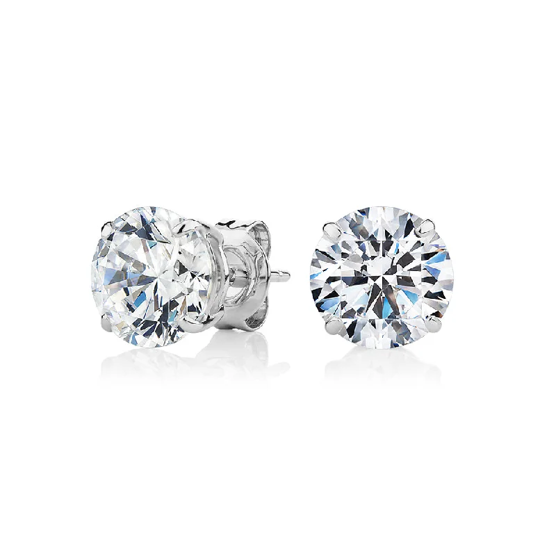 Stunning Statement Jewelry, Unbeatable Discounts Round Brilliant stud earrings with 4 carats* of diamond simulants in 10 carat white gold