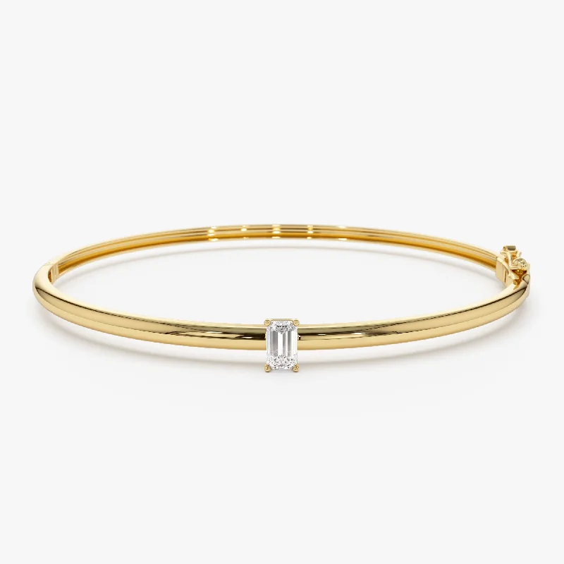 Bestselling Jewelry Now On Sale – Elevate Your Look 14K Emerald Shape Diamond Solitare Bangle Bestselling Jewelry Now On Sale – Elevate Your Look 14K Emerald Shape Diamond Solitare Bangle