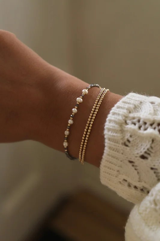 Elegant Designs, Unbeatable Discounts – Shop Jewelry Now SMOKY PEARL BRACELET