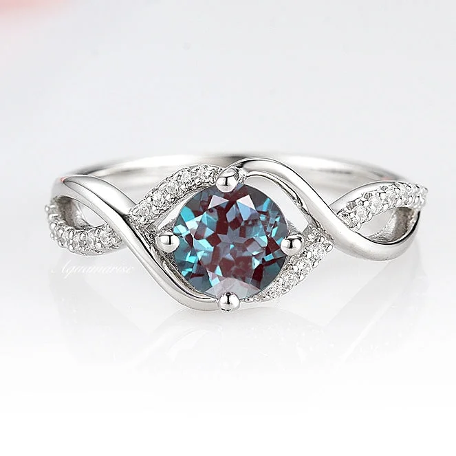 Timeless Jewelry At Special Discount Rates Entwined Teal & Purple Alexandrite Ring- Sterling Silver Timeless Jewelry At Special Discount Rates Entwined Teal & Purple Alexandrite Ring- Sterling Silver