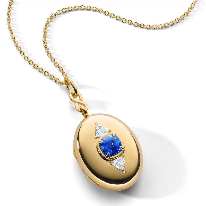 Stunning Jewelry At A Fraction Of The Price Special Edition Blue Sapphire and Trillion Cut Diamond Locket